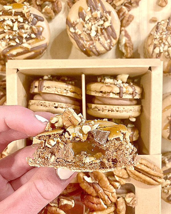 Brynn Hillman does all her own marketing photos, using only her cellphone, and then posts them on her Instagram account, where her customers can look at her menu and place orders. This photo of her turtle macarons shows off the pecans, chocolate, and caramel.