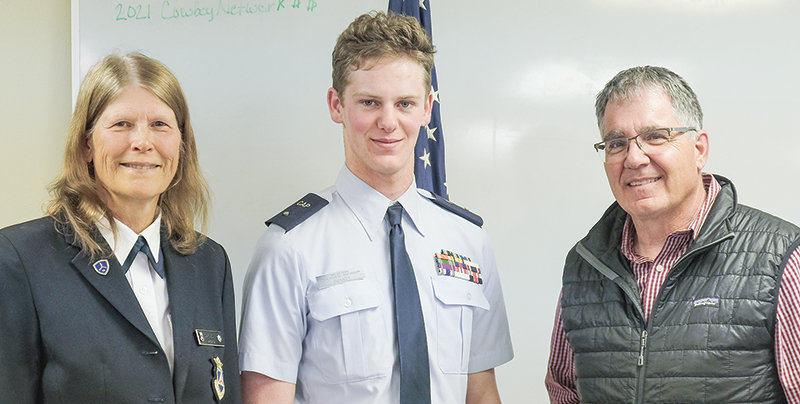 From left, Lt. Col. BJ Carlson of the Civil Air Patrol, Jay Swaney and Powell Mayor John Wetzel pose after Swaney was promoted to Cadet 2nd Lt. on May 3.