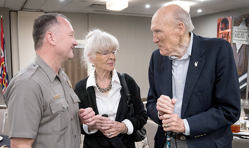 Yellowstone National Park Supervisor Cam Sholly greets former U.S. Senator Al Simpson and his wife Ann during the 2020 National Parks Day in Cody. Simpson will receive the Presidential Medal of Freedom in July.