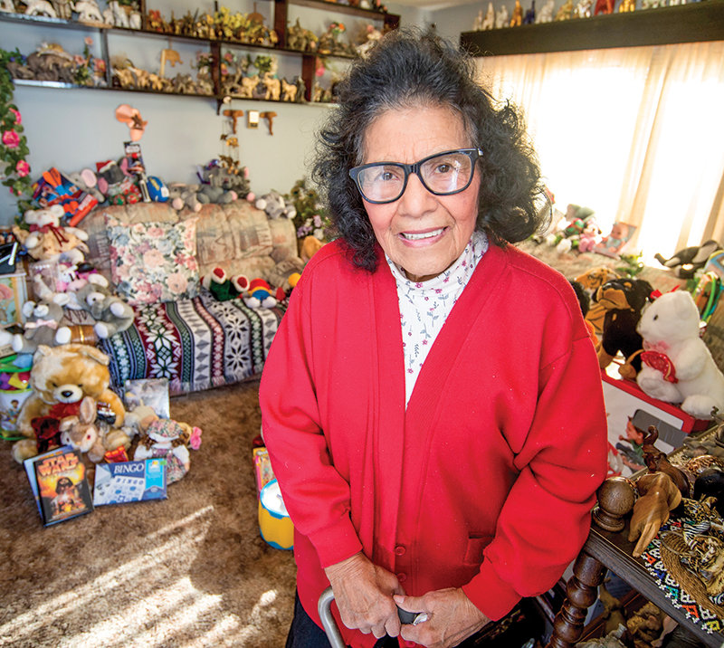 Sally Montoya, called the Mother Teresa of Park County by former U.S. Senator Al Simpson, is shown with donations for the Powell Christmas Basket program in 2017. Montoya died Tuesday morning in Powell.