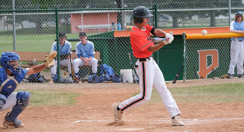 Dalton Worstell looks to drive a pitch during the Pioneers game against Cody on Tuesday. The Pioneers dropped to .500 in the A Northwest after losing the doubleheader.