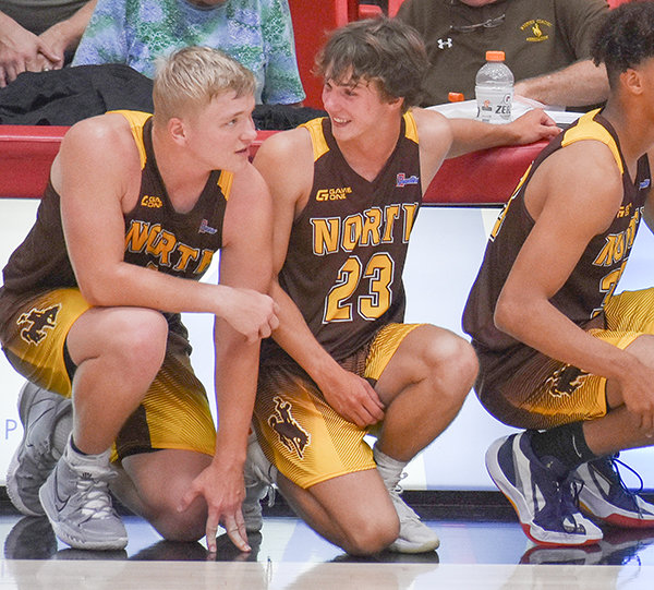 Toran Graham (left) and Zach Ratcliff share a moment on the sideline while waiting to check into the Wyoming Coaches Association All-Star game on July 23.