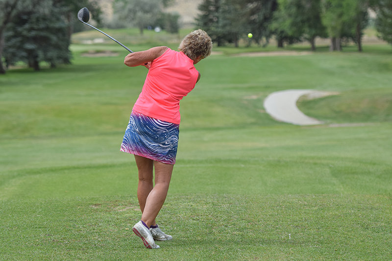 Teresa Eicher drives a tee shot on the 10th during an extra hole playoff vs. Laurie Lee. Eicher edged out Lee on the 10th to capture the Powell Golf Club Ladies Senior Division title in the 2022 Ron Rickert Memorial Club Championship.
