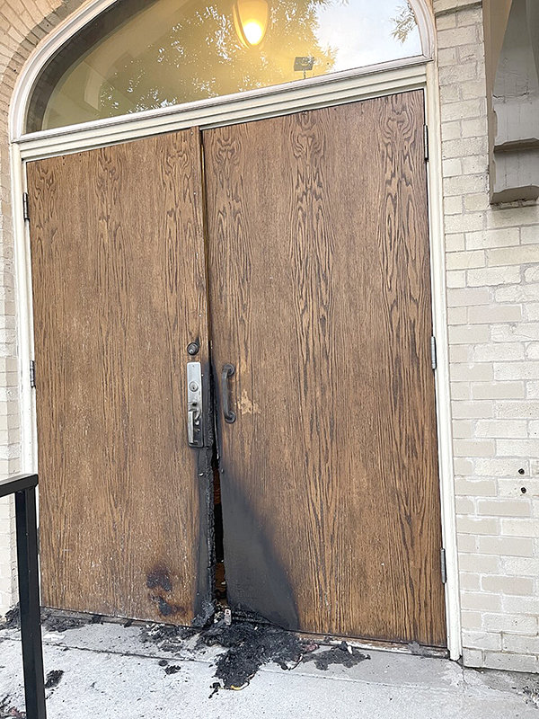 The front door of St. Luke’s Episcopal Church in Billings was badly charred at the bottom after being allegedly set on fire by former Powell resident Jodi Moore. Moore also broke church windows and set a fire at a nearby dormitory.