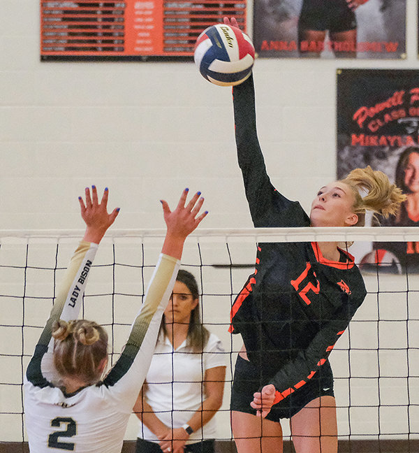 Addy Thorington rises up against Buffalo on Saturday. She finished with a match-high 24 kills in the victory.