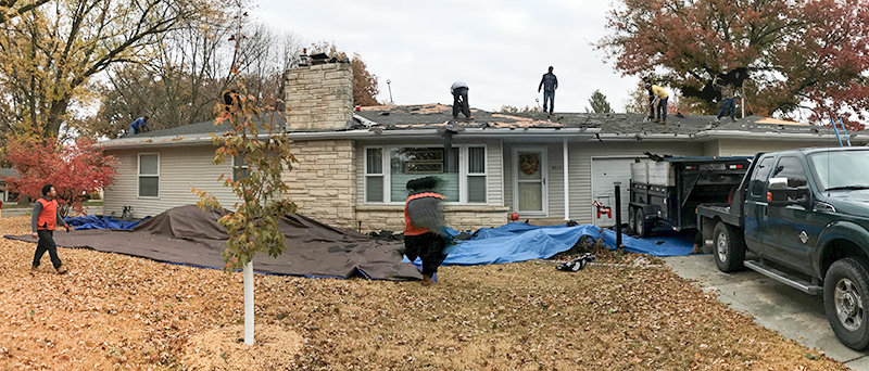 The Moseley house roof receives its latest demolition and removal. It is the latest of three the Moseleys have had to replace in York, Nebraska.