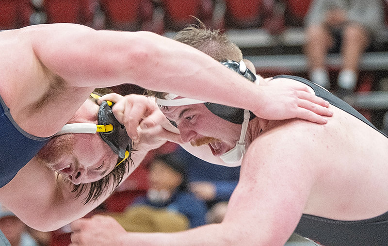 Cody Pinkerton (right) battles during the Joe Mickelson Memorial Wrestling Open on Nov. 5. The Trappers went on the road and took down No. 4-ranked Northwest Kansas Tech on Nov. 10 in Rock Springs.