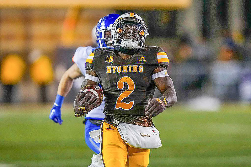 Wyoming running back Titus Swen had a career night against Boise State finishing with a career-high 212 rushing yards against the Broncos.