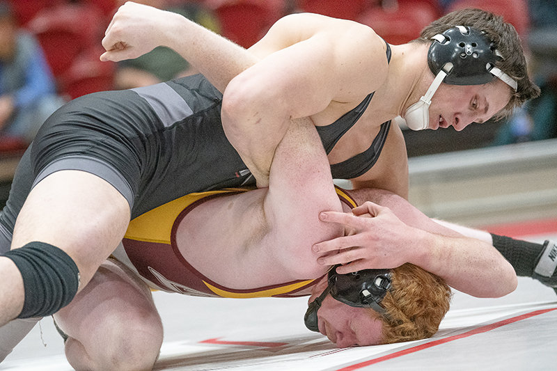 Ryker Blackburn pins down his opponent during a dual with MSU-Northern on Jan. 10.