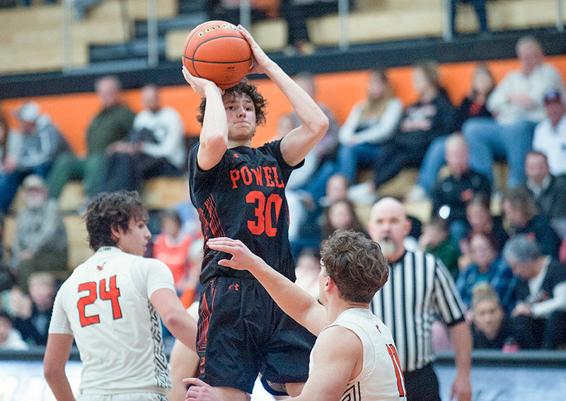 Gunnar Erickson puts up a shot over a Worland defender during the Panthers’ loss on Saturday. Erickson and the Panthers nearly rallied in the second half but came up short to start 1-1 in conference play.