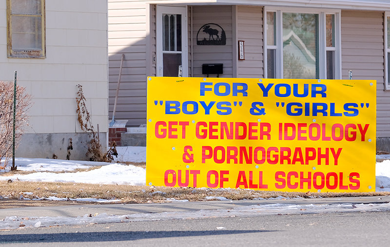 A local resident has angled a sign to face Southside Elementary School urging parents to keep gender ideology out of schools. An accompanying sign reminds parents, ‘The kids are yours, not theirs!’