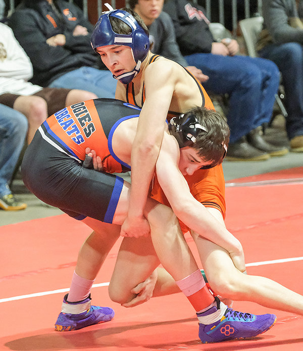 Gabe Whiting grapples for position during his semifinal bout on Friday night.