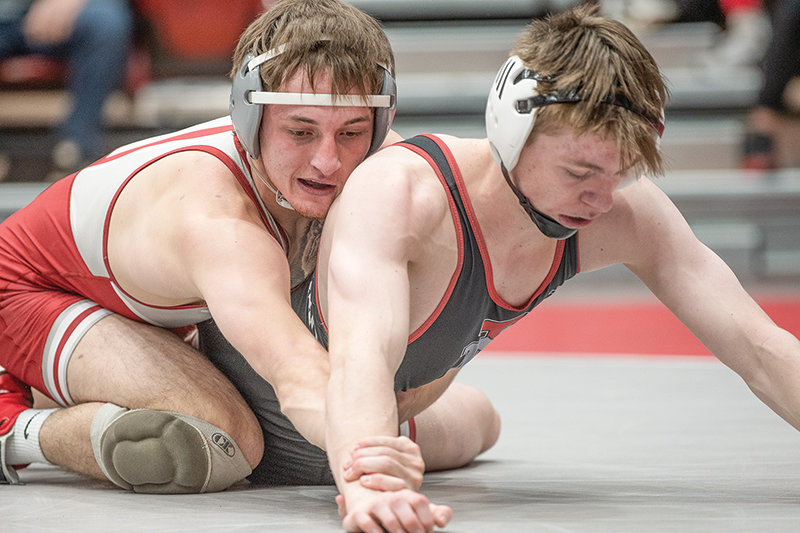 Brady Lowry (left) heads to the national tournament at 149 pounds as a returning All-American from the 2020 season.