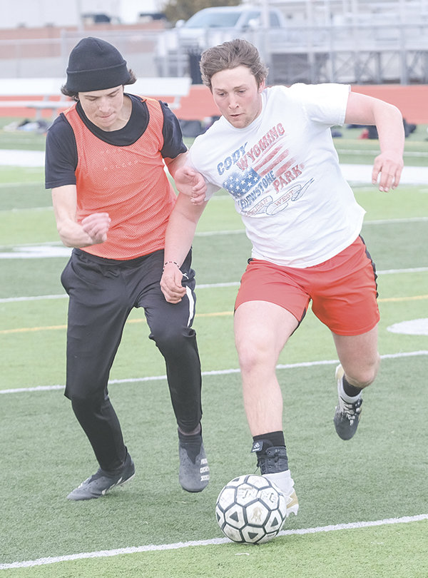 Steven Stambaugh (right) battles with Logan Jensen during practice on Tuesday. Jensen and Stambaugh are two returning defenders for the Panthers this season.
