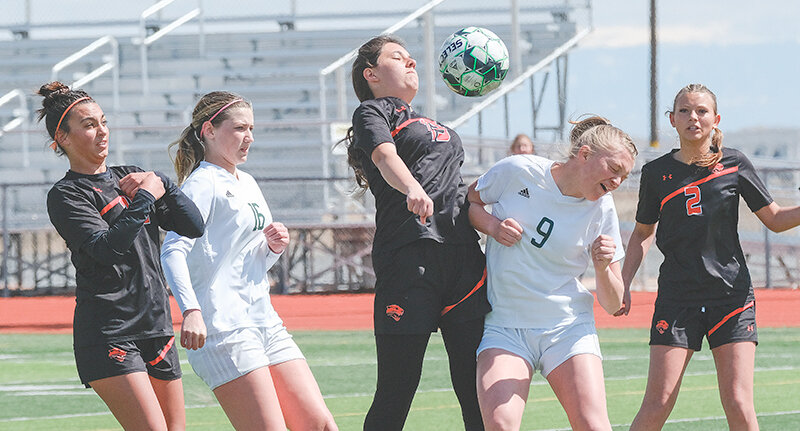 Sara Shopa (middle) tries to bring down a ball in the box against Pinedale, while Kenzie Fields (left) and Jordyn Dearcorn look on. The Panthers moved to 5-2 in the 3A West after a pair of home victories against Lander and Pinedale.