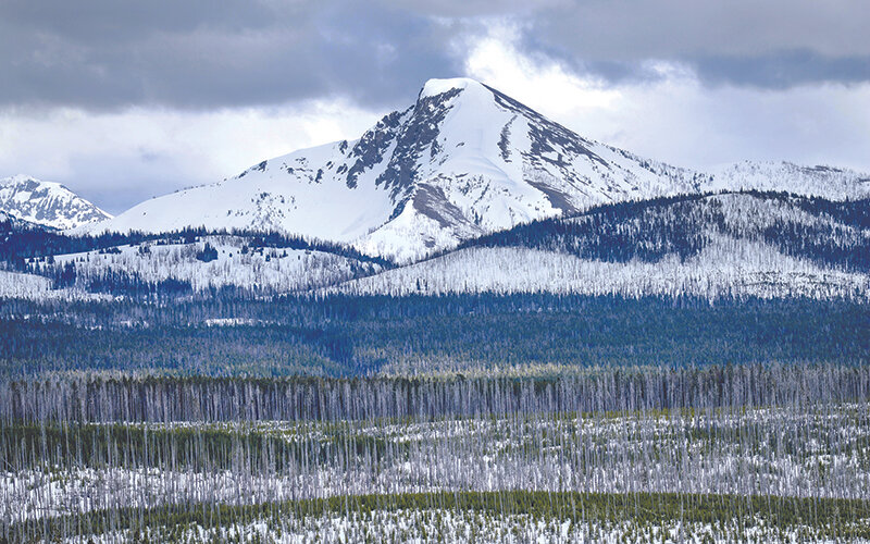 Snow covers the highest peaks at Yellowstone National Park as well as at Yellowstone Lake level.