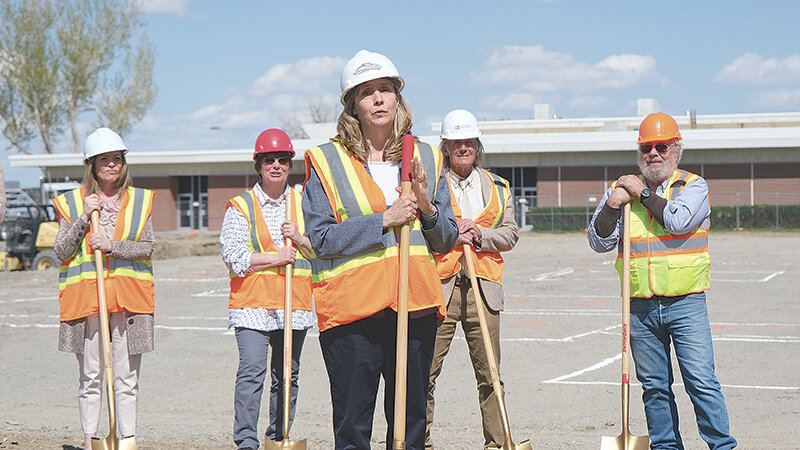 Northwest College President Lisa Watson (center) speaks during the groundbreaking ceremony for the new student center Monday, while, from left, Wyoming Community College Commission Executive Director Sandy Caldwell, and NWC trustees Denise Laursen, John Housel and Larry Todd look on.