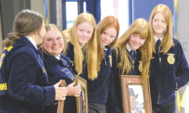 The Powell-Shoshone FFA Chapter at its End of The Year FFA Banquet gifted Brooke Bessler, Katie Beavers, Baylee Brence, Emma Brence, Kathryn Brence and Charlee Brence framed photos to remember their loved ones who died this year.