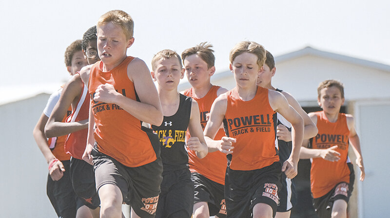 Tucker Muecke (left) leads a pack of runners during the 800 in Lovell. While David Stearns (far left), Tanner Anderson (center), Landon McDonald and Orin Letterman Onstine try to make up ground early in the race. Powell wrapped up the spring track season in Lander at the Best of the Best.