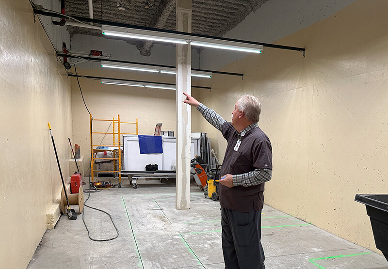 Brad Tyer, plant operations director, stands in one of the rooms to be remodeled.