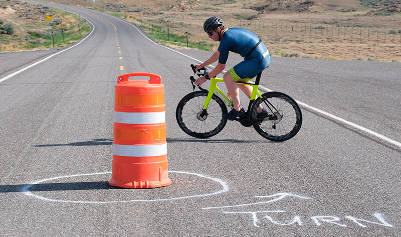 PAC Triathlon winner Dan Lavy reached the turnaround point of the bike ride, edging out a win over Arthur Thompson by 31 seconds in the overall standings on Saturday.