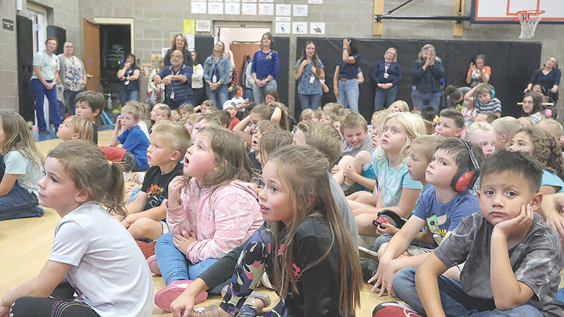 Southside Elementary School students hunkered down for an all school assembly, but they didn’t know what it was for. They later found out Southside was one of just over 300 schools named a National Blue Ribbon School. Students in the foreground included, from left, Finley Bernard, Eva O’Brien and Urijah Guerro.