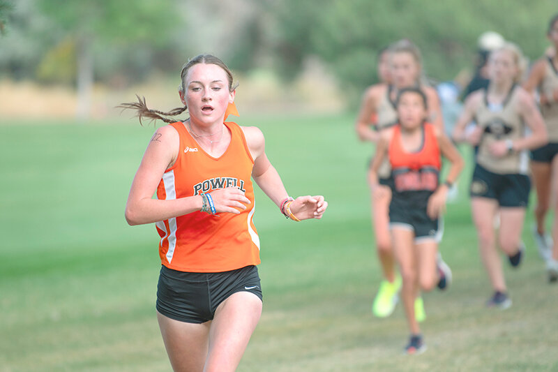 Kinley Cooley leads a group of runners at the Foxes and Hounds in Cody on Thursday. Cooley returned as the lead runner for the Panthers finishing in 20:09.69.