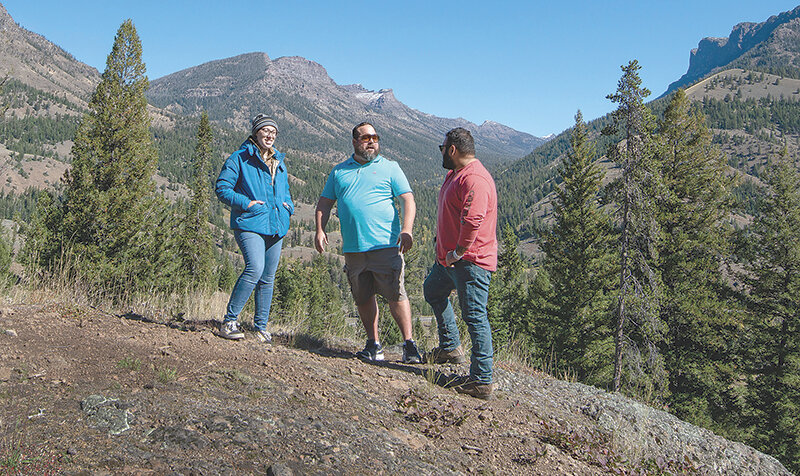 General manager Elizabeth Wells, (from left), owner Nick Piazza and operations manager Jonathan Algarin meet at the top of Sleeping Giant to go over plans to building more safety and fun into the facility.
