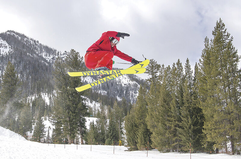 A skier gets some air during a March terrain competition at Sleeping Giant Ski Area near the East Gate of Yellowstone National Park. The staff has enlarged the acreage for skiing, including building a tubing park and increasing areas for both beginning and advanced skiers in preparation for the coming season. The facility plans to open Dec. 2 and reduced price season tickets go on sale Oct. 1-Oct. 31.