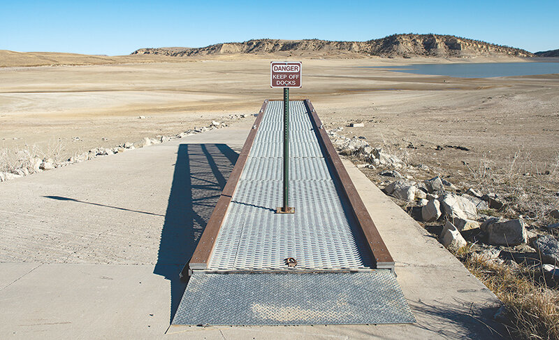The boat ramps and docks at Upper Sunshine Reservoir are closed as the body of water slowly refills. Currently at 10% capacity, the reservoir was drained this past summer to check the Sunshine Dam for damage.