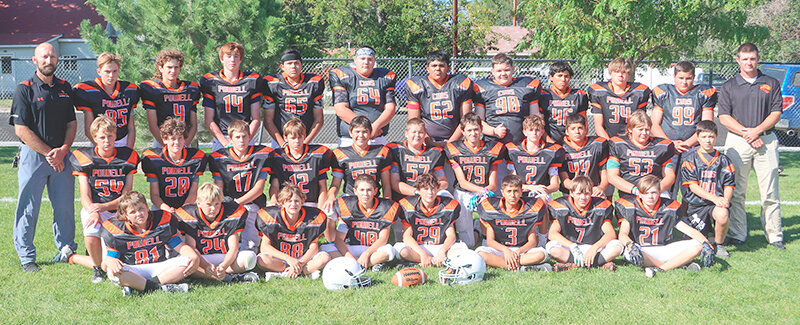 The undefeated 2023 seventh grade Cub football team pose for a team picture. Back row from left: coach Juston Carter, Lincoln Hull, Owen Jones, Ethan Ely, Matthew Braley, Connor Lohrenz, Eric Hernandez, Ian Gibson, Justin Marquez, Trevin Morton, Tristen Snell and coach Nick Fulton. Middle row from left: Kooper Arends, Desmond Bear, Forest Kleinfeldt, Kash Kojakanian, Ian Nelson, Andrew Walker, James Schaefer, Trey Schultz, Isaiah Torres, Eli Bear and Blake Bessler. Front row from left: Dylan Johnson, Levi Rogers, Karson Howe, Weston Loeper, Karzten Carter, Axel Caro, Russell Goolsbey and Parker Clark. Mason Cheatham and coach Carson Kleinfeldt are not pictured.