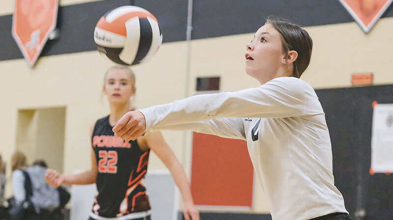 Abigail Visocky (right) helped lead a strong defense for the eighth grade Powell volleyball team, as the Cubs battled to a fourth place finish this season.
