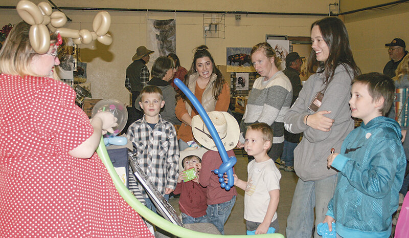 Hannah Hauley drew the attention of many children with her entertaining balloon animals Nov. 28 at the Clark Christmas Jingle.