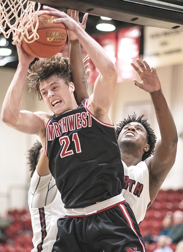 Kolter Merritt snags a rebound against North Idaho on Thursday. The Trappers lost to the Cardinals before defeating Real Salt Lake on Saturday.