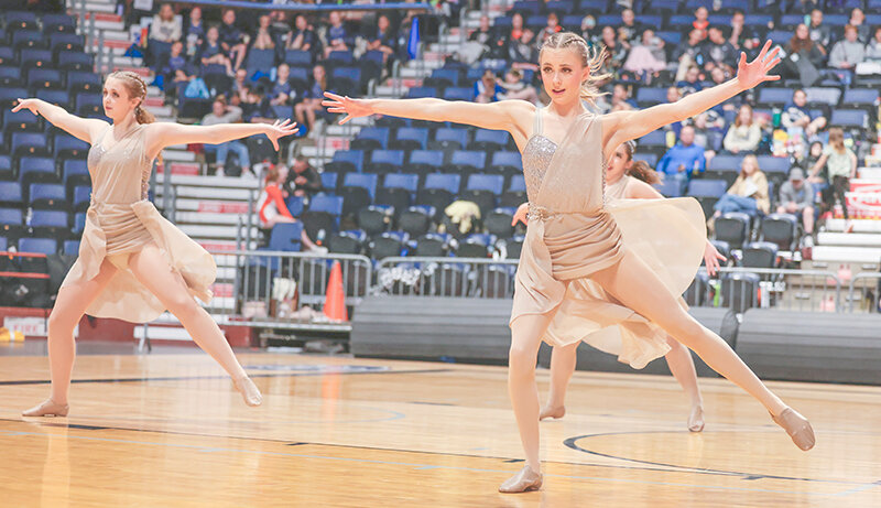 Caitlin Belmont (left) and Anna Smith helped the Powell Panther jazz routine place second at the state competition after not competing last year. The dance team had a late start but finished strong in Casper on Jan. 26.