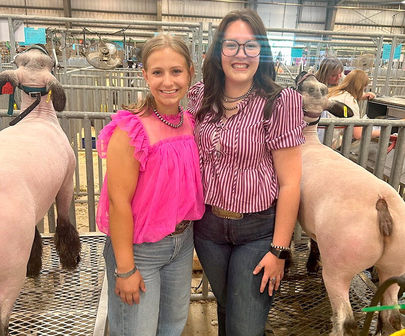 Katie Morrison (left) has followed along in the footsteps of her sister Allison in Powell Shoshone FFA.