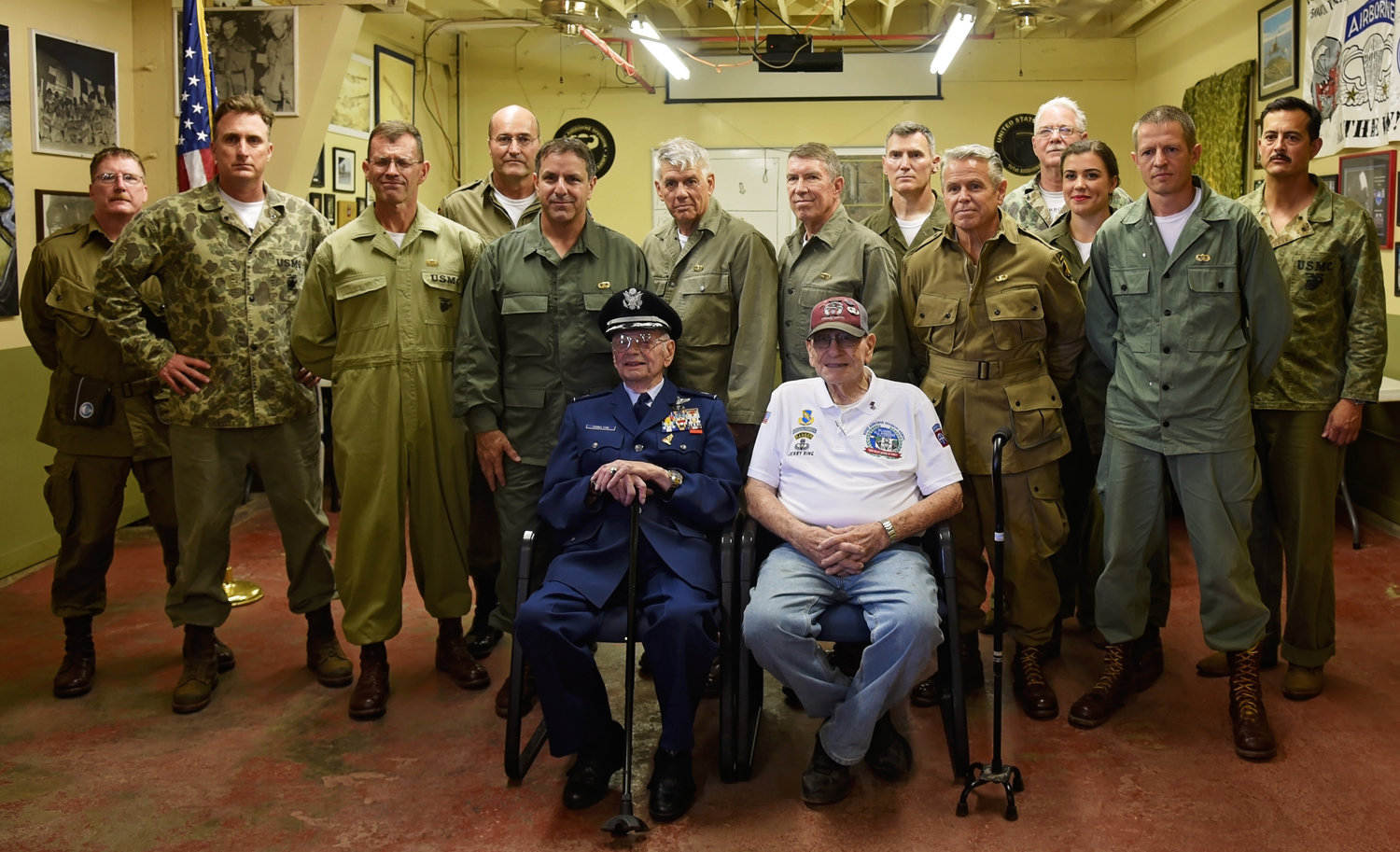 LTC Dave Hamilton (ret.) (front row, left) and veteran Jerry Ring (front row, right) are pictured with jump school students and WWII Airborne Demonstration Team members.