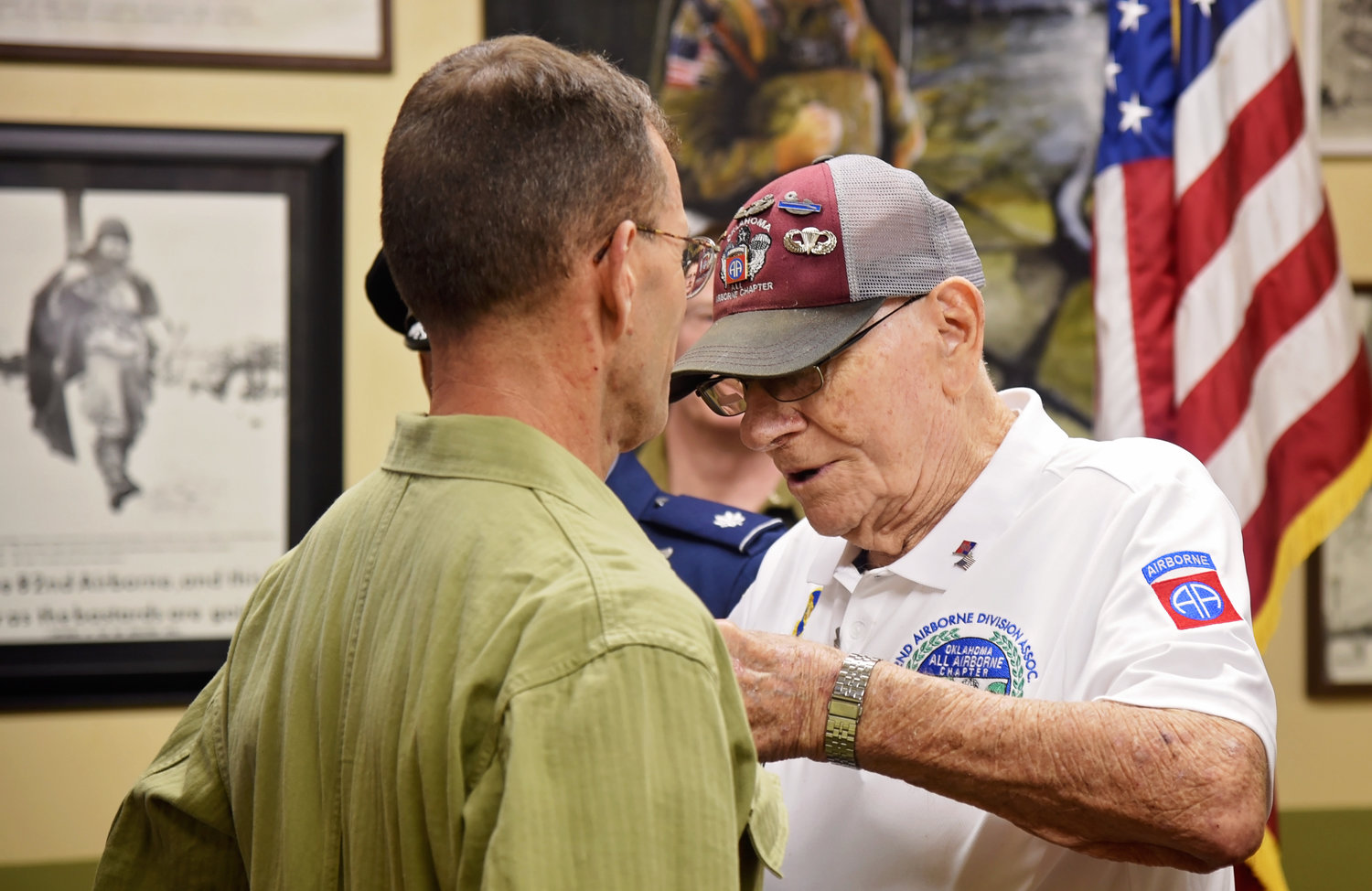 Jerry Ring pins wings on Martin Lockhart at the wing pinning ceremony held July 23, 2022.