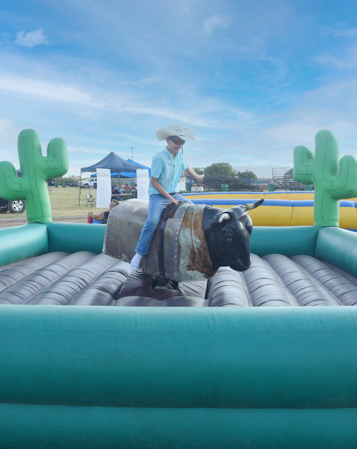 Layton Whitson tried his hand on a mechanical bull at the Operation C.A.R.E. fundraiser rodeo held Aug. 5 and Aug. 6, 2022.