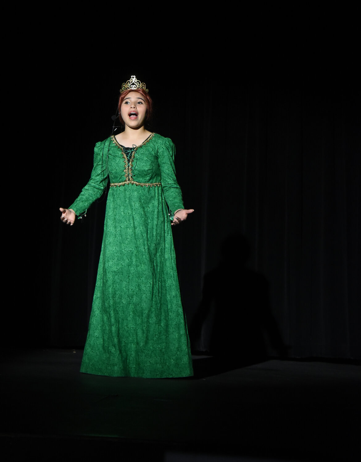 Liana Garza portrayed Adult Fiona in Frederick Middle School’s production of Shrek the Musical, Jr. and proved she can handle big roles. Her acting and singing lit up the stage.
