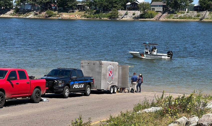 Authorities search Wednesday afternoon for the body of a missing man who drove into the Tennessee River at the Saltillo boat ramp while fleeing from law enforcement officers.