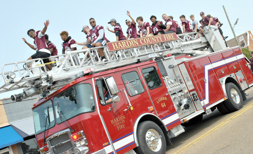 Hardin County High School football players atop a Savannah fire truck during the 2021 homecoming parade.