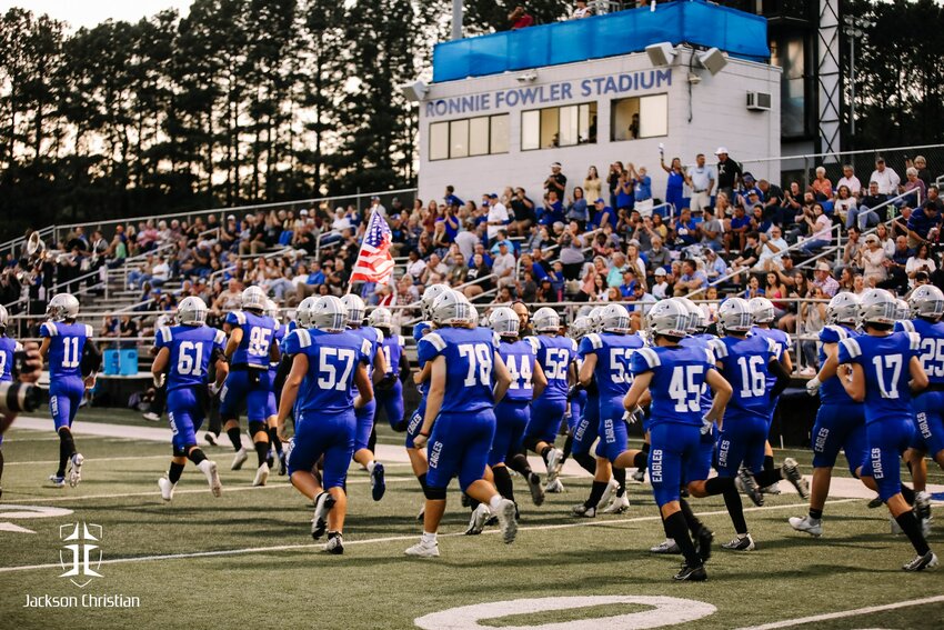 The Jackson Christian football team, seen here entering the stadium before homecoming last year, returns a good amount of experience off last year’s team that finished 10-2.