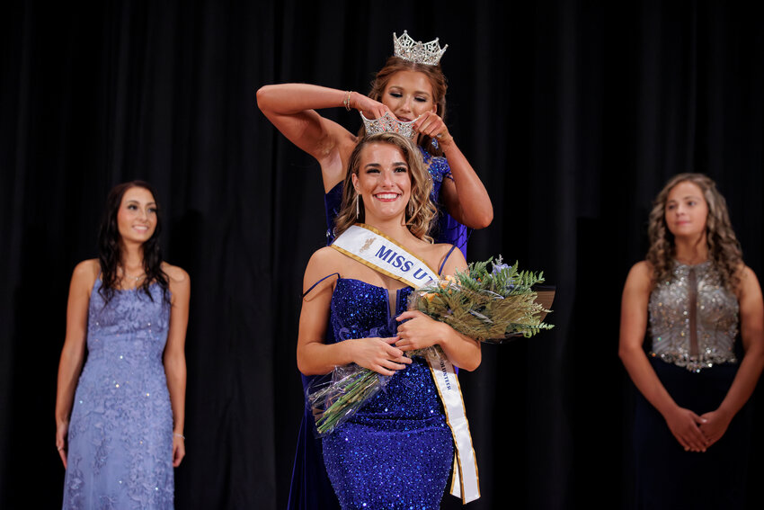 MISS UTM – Maleia Bigham (front) is crowned Miss University of Tennessee at Martin Volunteer on Sept. 10 by former Miss UTM Volunteer Caleigh Jo Erwin. Bigham is one of six contestants with ties to UT Martin competing in the Miss Tennessee Volunteer Pageant, taking place July 24-27 at the Carl Perkins Civic Center in Jackson.