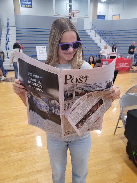 CATCHING UP ON NEWS-One Westview student reads The Martin Post and catches up on all the recent local news.