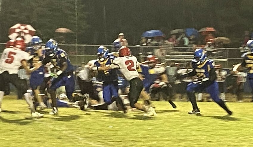 North Side running back Miles Howard tries to gain more yardage in their win earlier this month against Lexington at home.