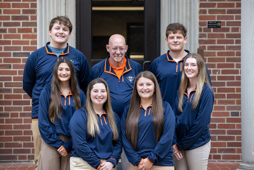 NFL LONDON – Working at the two NFL games being played in London Oct. 6 and Oct. 13 are (front row, L-R) Haley Olsen, Lindsey Cross, Cheyenne Stewart, Bridget Vieau, (back row, L-R) Connor Butts, Dr. Dexter Davis and Jaden Knott.