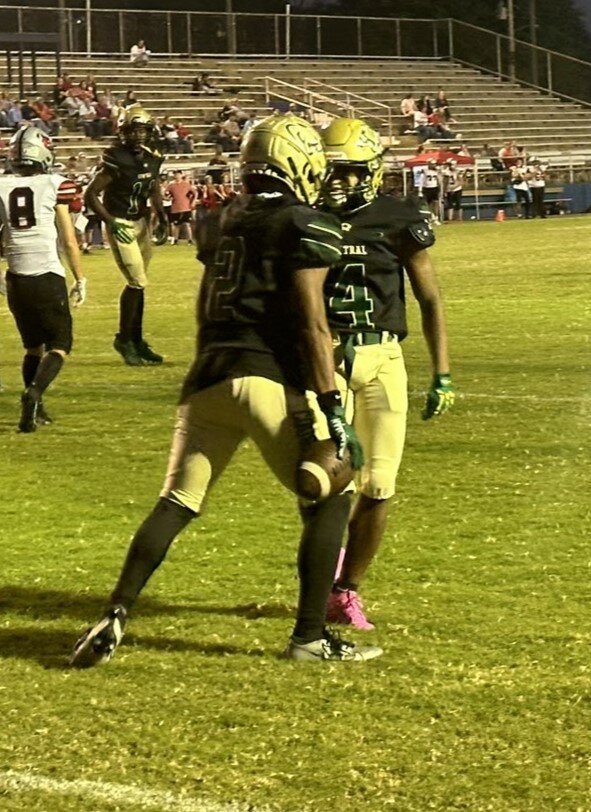 Jackson Central-Merry receivers Michael Massey and Brian McKnight celebrate a touchdown score against Adamsville during homecoming last week.