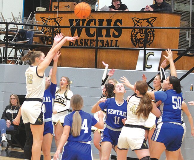 #12 Blair Baugus with the jumper against the Lady Tigers.