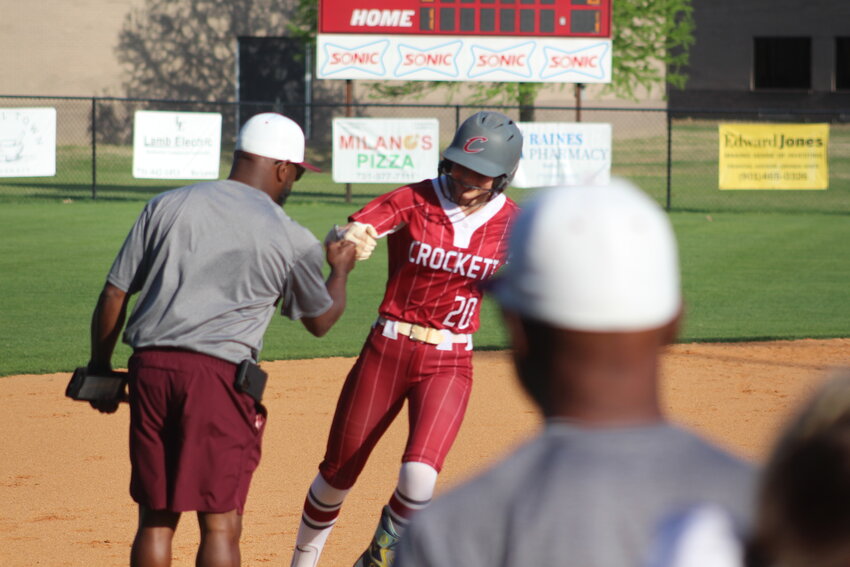HOMERUN - Lady Cavalier Wesley Thorton rounding 3rd in celebration after hitting a homerun.